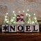 Haute Decor Christmas Wood Blocks Noel with Snowmen Couple, LED Lighted Trees, Battery Operated Automatic Timer - Prelit Christmas Holiday Decoration for Table, Shelving, Counter, Mantel